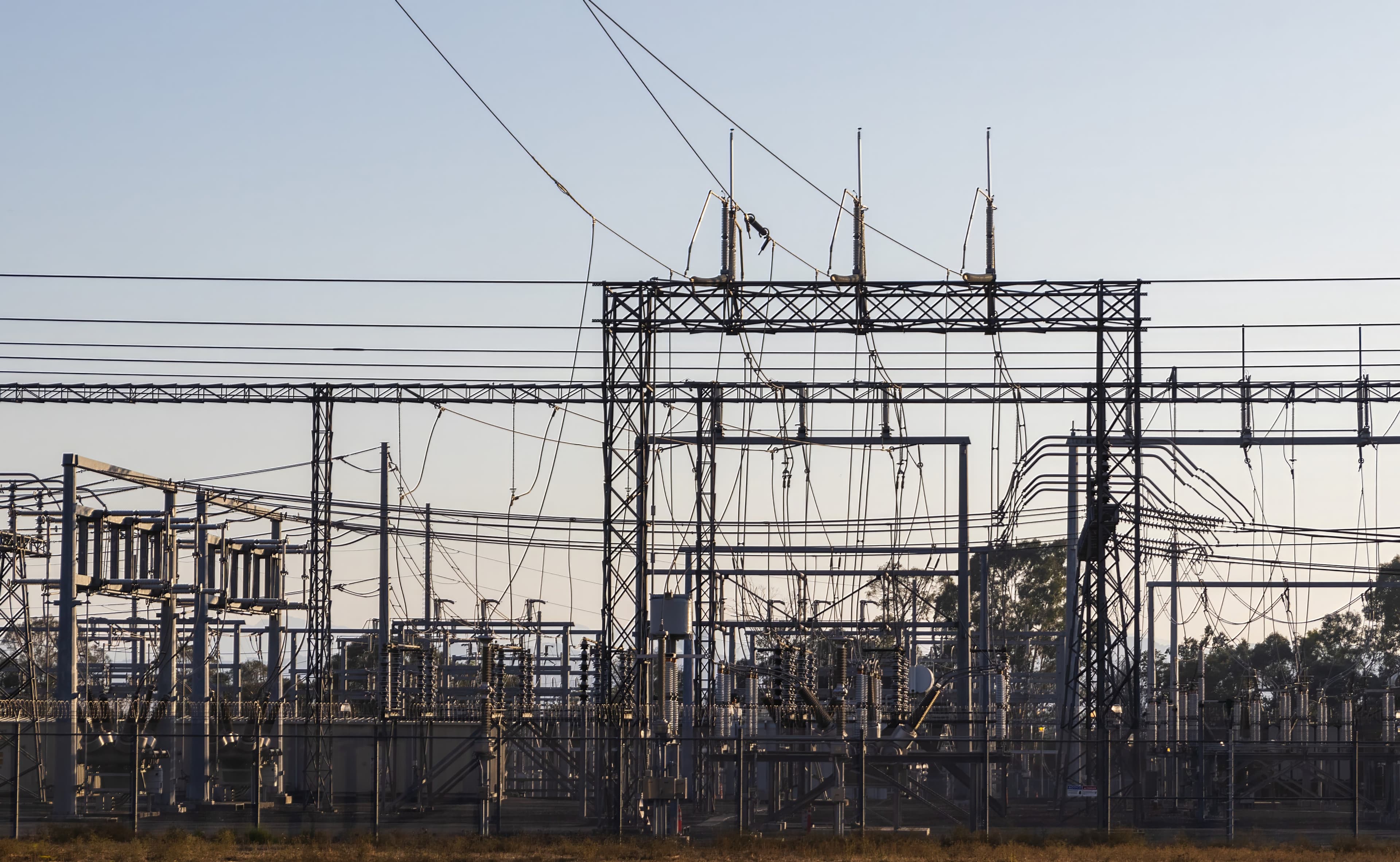 Power grid infrastructure at sunset, systems we help customers run